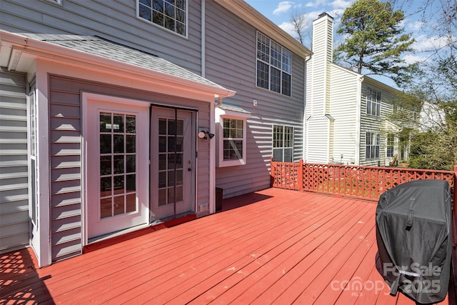 deck featuring a grill