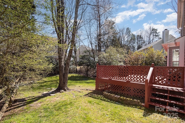 view of yard featuring a deck