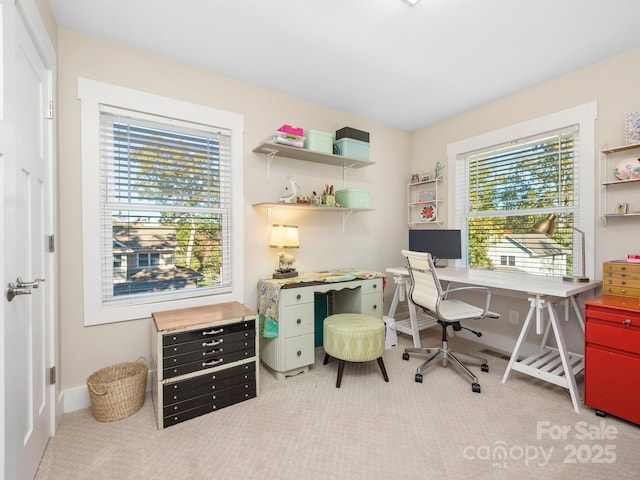 home office featuring carpet flooring and baseboards