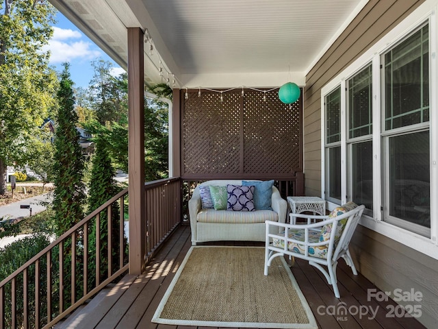 wooden deck featuring a porch