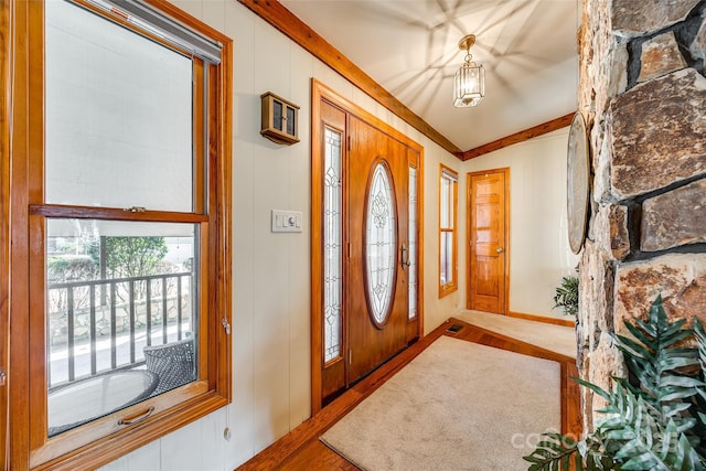 foyer featuring visible vents and wood finished floors