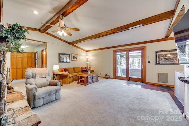 living room with lofted ceiling with beams, carpet floors, a ceiling fan, and baseboards