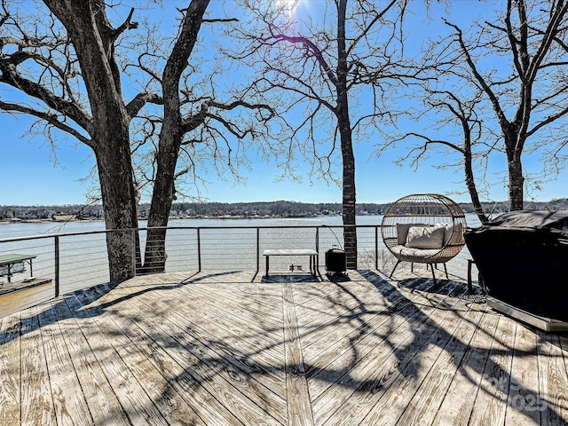 deck featuring a water view