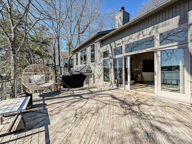 wooden terrace with grilling area