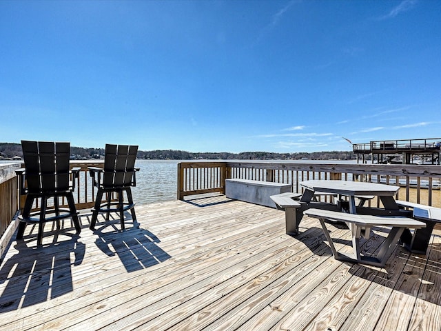 view of dock with a water view