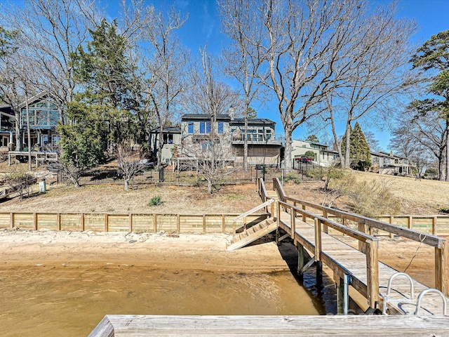 view of dock with fence