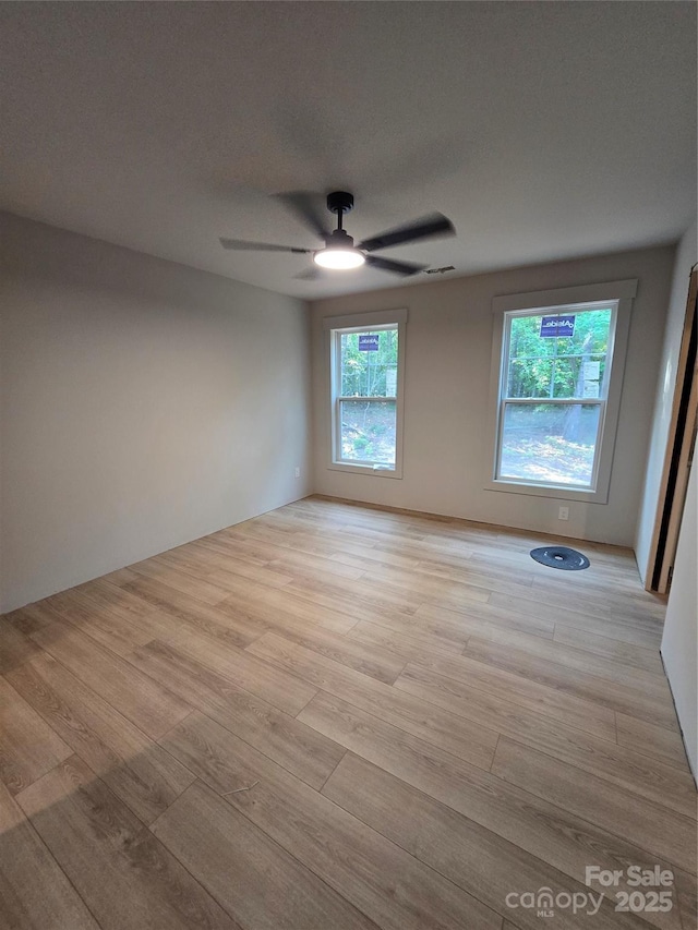 44389 US-52 Hwy N, Richfield, NC 28137 - empty room with light wood-style floors and a ceiling fan