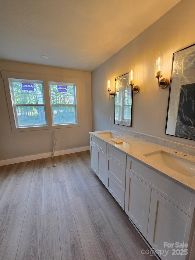 44389 US-52 Hwy N, Richfield, NC 28137 - full bathroom featuring plenty of natural light, wood finished floors, double vanity, and baseboards