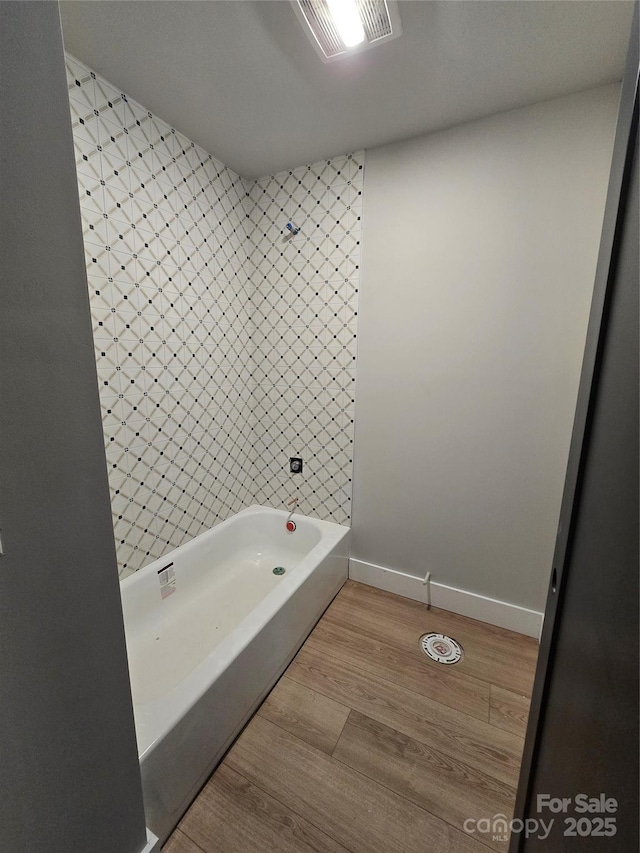 44389 US-52 Hwy N, Richfield, NC 28137 - full bathroom with a bath, wood finished floors, and baseboards