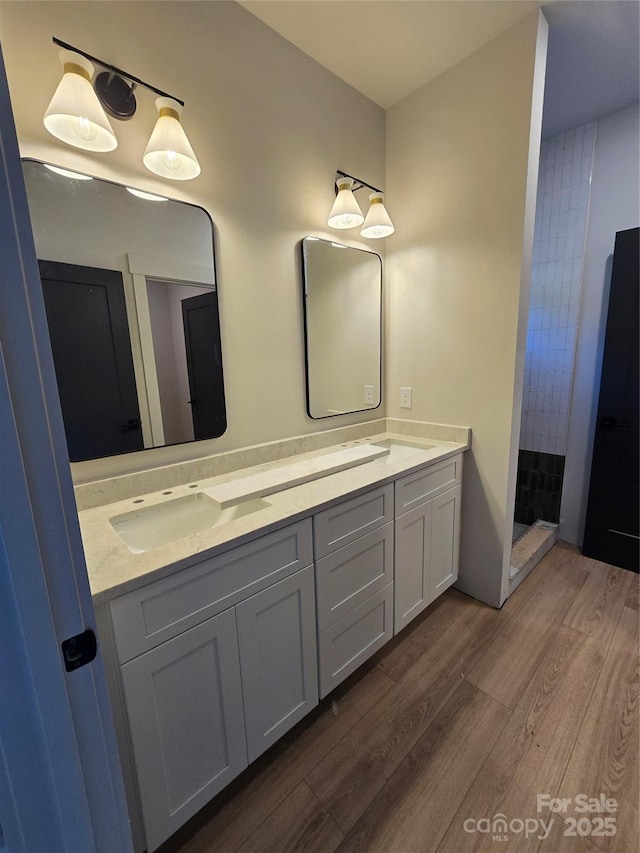 44389 US-52 Hwy N, Richfield, NC 28137 - bathroom with wood finished floors, double vanity, and a tile shower