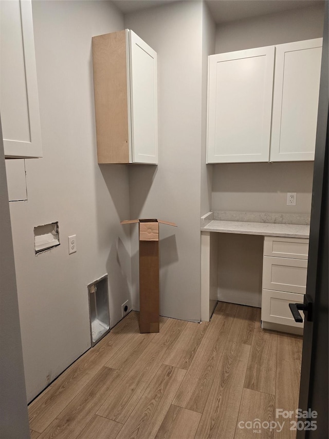 44389 US-52 Hwy N, Richfield, NC 28137 - laundry room with light wood-style floors, cabinet space, hookup for a washing machine, and an office area