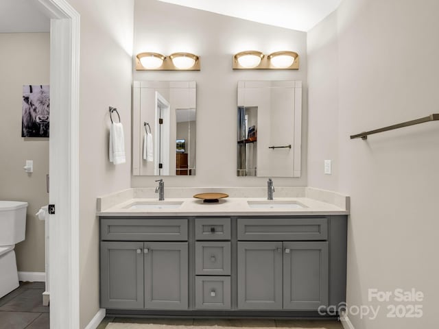 1973 Buffalo Creek Rd, Lake Lure, NC 28746 - bathroom with baseboards, tile patterned flooring, a sink, and double vanity