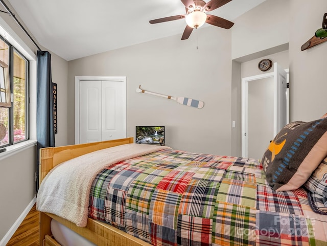 1973 Buffalo Creek Rd, Lake Lure, NC 28746 - bedroom with vaulted ceiling, a ceiling fan, wood finished floors, a closet, and baseboards
