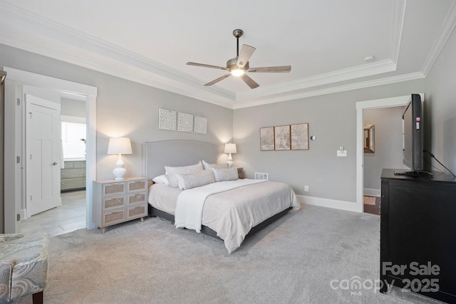 bedroom featuring a ceiling fan, baseboards, ornamental molding, and carpet flooring