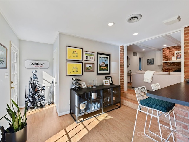 interior space featuring recessed lighting, wood finished floors, and visible vents