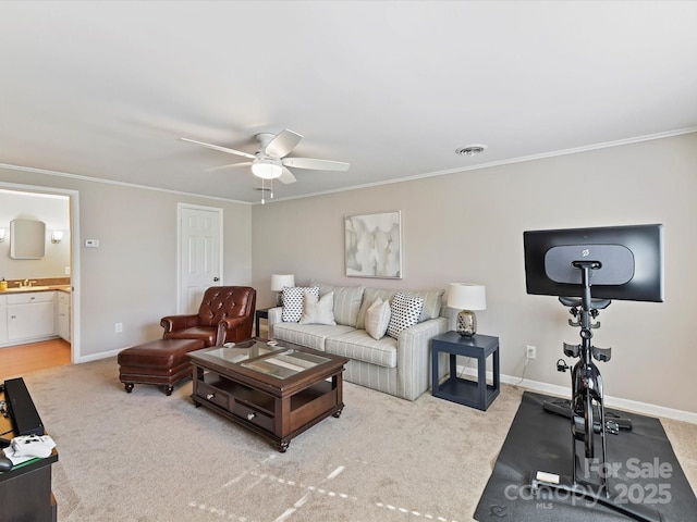 living room featuring visible vents, light colored carpet, crown molding, and baseboards