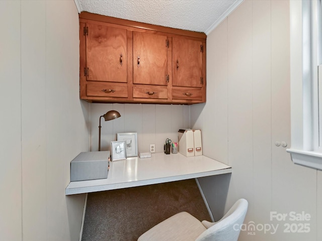 laundry room with a textured ceiling