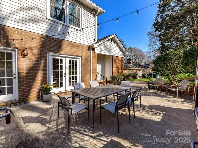 view of patio / terrace with french doors and outdoor dining area