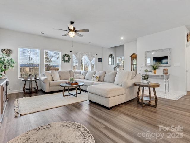 living room with dark wood-style floors, recessed lighting, ceiling fan, and baseboards