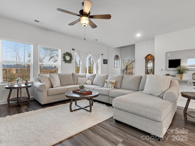 living room with ceiling fan, dark wood finished floors, visible vents, and recessed lighting