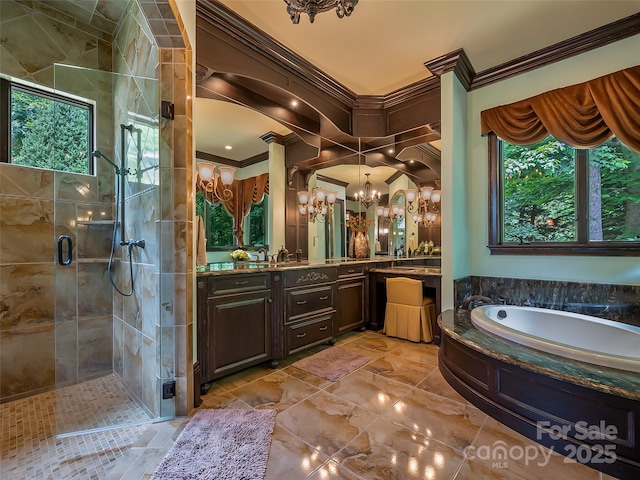 bathroom featuring crown molding, a stall shower, vanity, a chandelier, and a bath