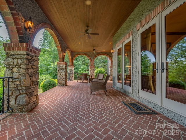 view of patio with ceiling fan