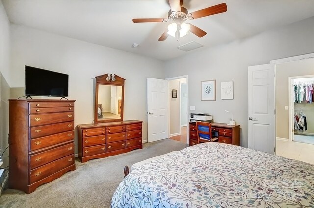 bedroom with carpet floors and a ceiling fan