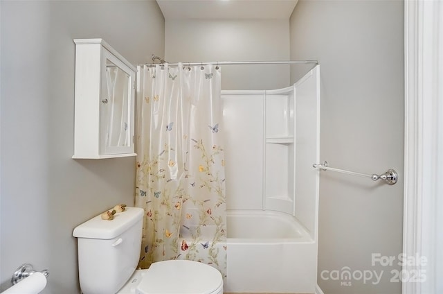 bathroom featuring toilet and shower / bathtub combination with curtain