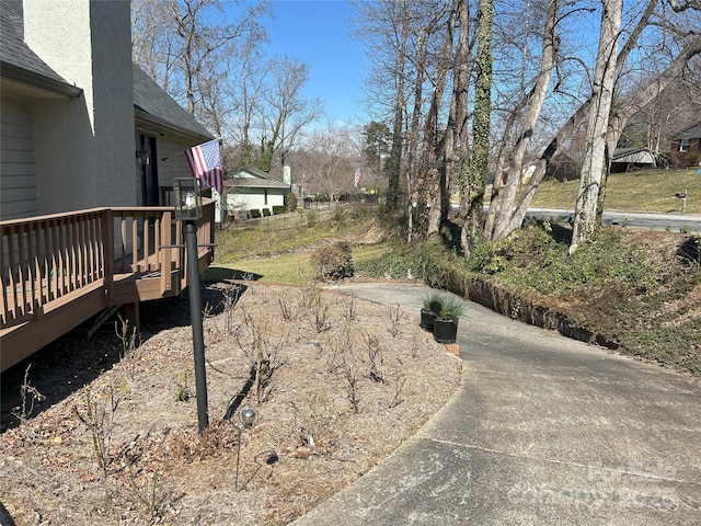 view of yard with a deck