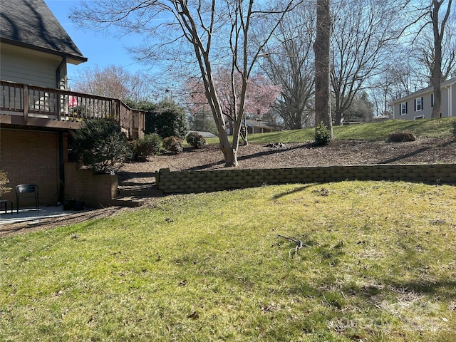 view of yard with a deck