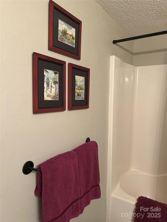 bathroom featuring a textured ceiling