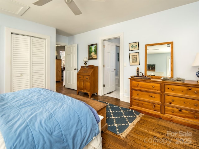 bedroom featuring attic access, a closet, ceiling fan, and wood finished floors