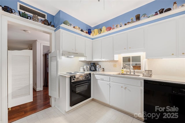 kitchen with electric range oven, dishwasher, light countertops, under cabinet range hood, and a sink