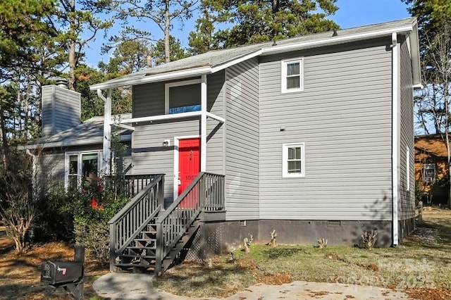 view of front of house featuring crawl space