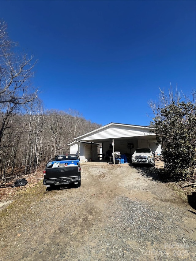 view of home's exterior with driveway