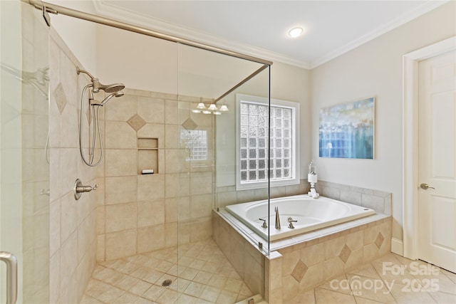 bathroom with tile patterned floors, a shower stall, crown molding, and a garden tub