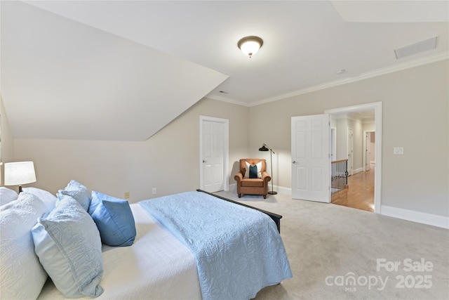 bedroom with visible vents, carpet, baseboards, and ornamental molding