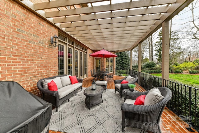 view of patio / terrace with an outdoor hangout area and a pergola