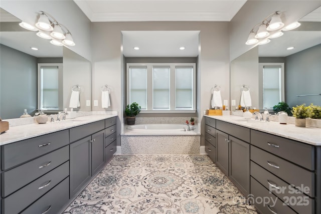 bathroom with a sink, two vanities, a bath, and tile patterned floors