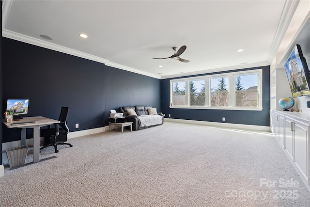 interior space with baseboards, a ceiling fan, ornamental molding, carpet flooring, and recessed lighting