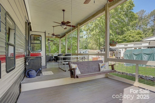 deck featuring a ceiling fan