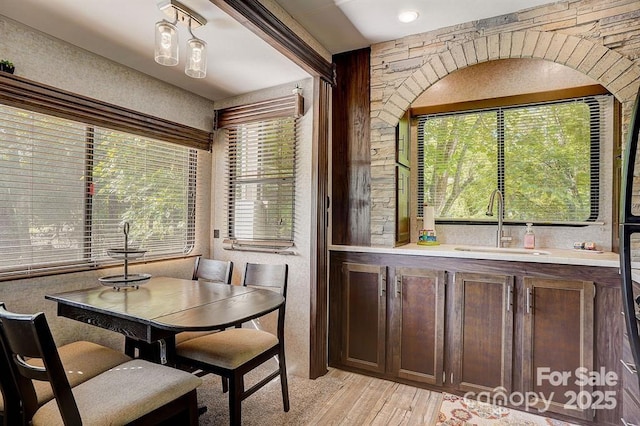 dining room featuring light wood-style flooring