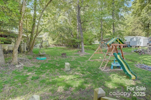 view of yard with a playground