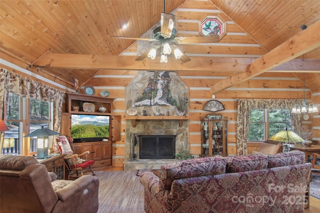 living area with lofted ceiling with beams, a fireplace, wood finished floors, and wood ceiling