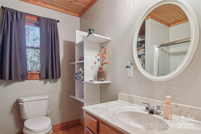 bathroom with toilet, wooden ceiling, an enclosed shower, and vanity