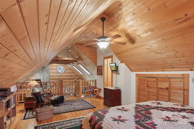 bedroom featuring wooden ceiling, wood-type flooring, and vaulted ceiling