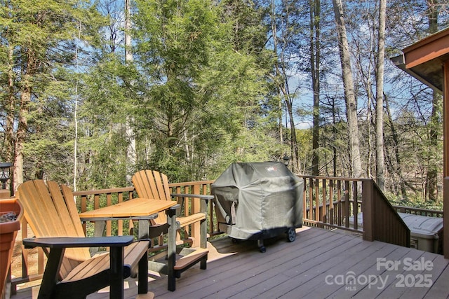 wooden terrace with grilling area