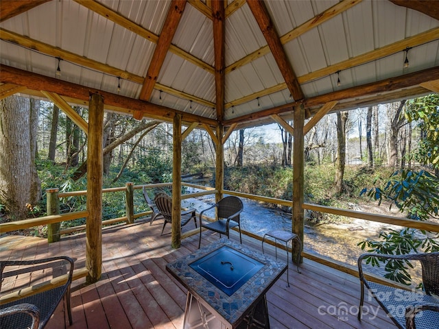 exterior space featuring lofted ceiling