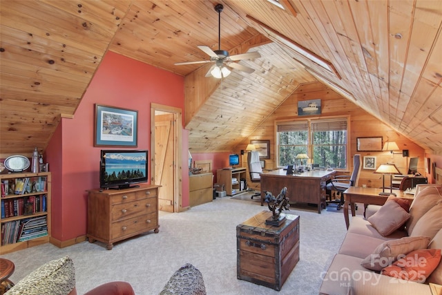 living room featuring lofted ceiling, carpet floors, wooden ceiling, and a ceiling fan