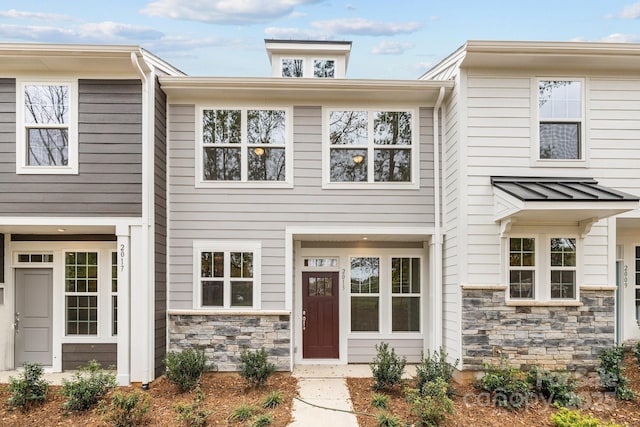 multi unit property with stone siding